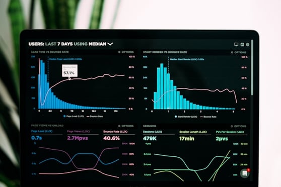 Image of laptop screen with analytics reports.